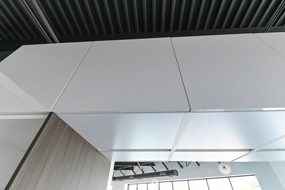 Häcker Modern Glossy White Kitchen with Island and Black Quartz Countertop