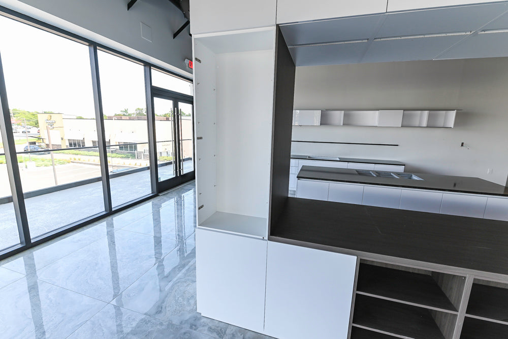 Häcker Modern Glossy White Kitchen with Island and Black Quartz Countertop