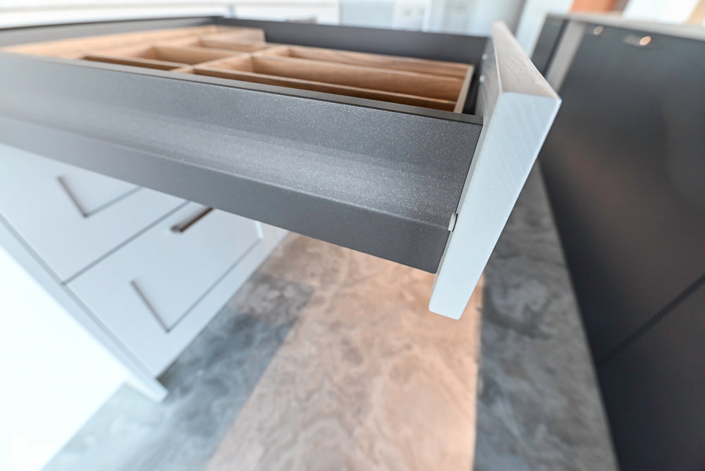 Häcker Transitional Light Grey Kitchen with Dark Grey Island and White Quartz Countertops