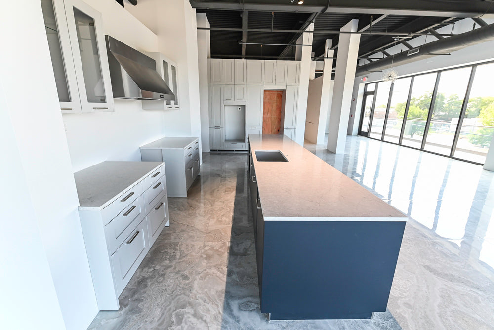 Häcker Transitional Light Grey Kitchen with Dark Grey Island and White Quartz Countertops
