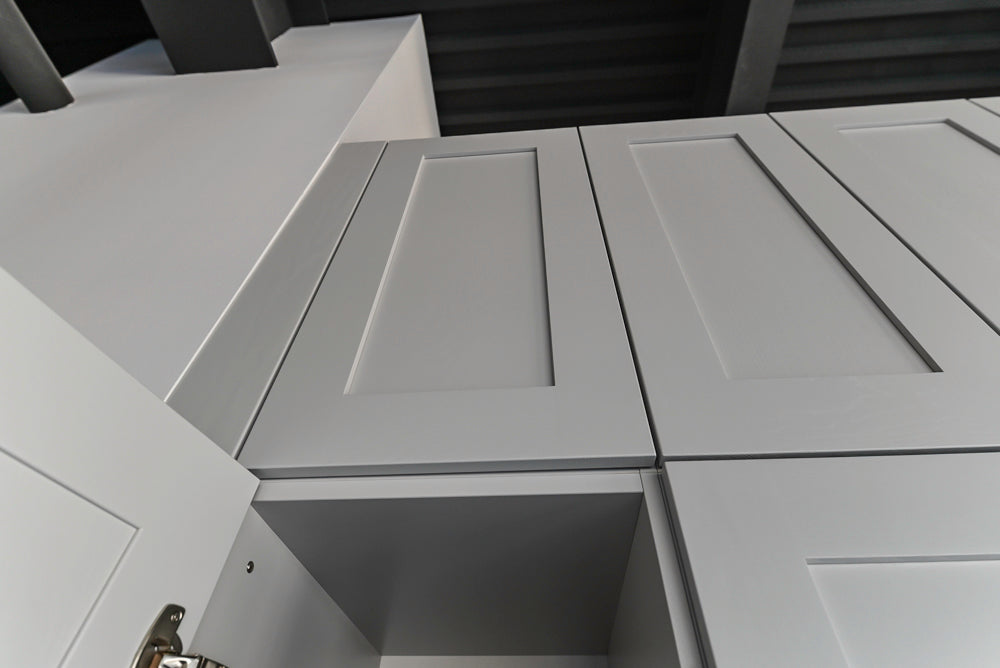 Häcker Transitional Light Grey Kitchen with Dark Grey Island and White Quartz Countertops