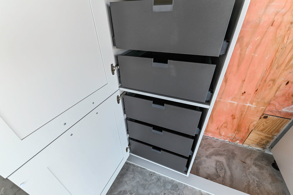 Häcker Transitional Light Grey Kitchen with Dark Grey Island and White Quartz Countertops