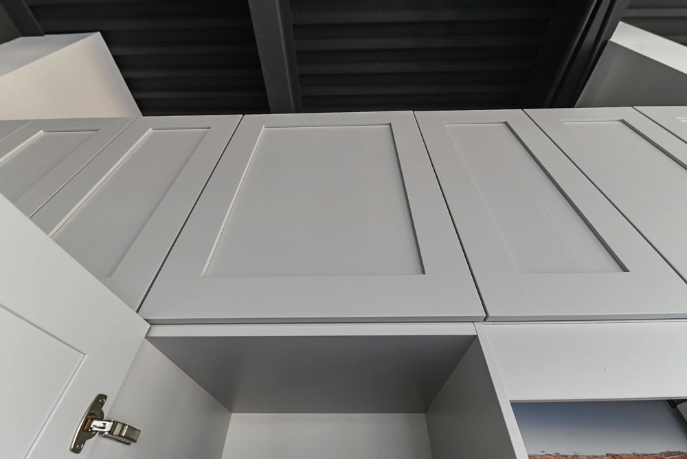 Häcker Transitional Light Grey Kitchen with Dark Grey Island and White Quartz Countertops