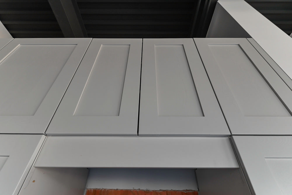 Häcker Transitional Light Grey Kitchen with Dark Grey Island and White Quartz Countertops