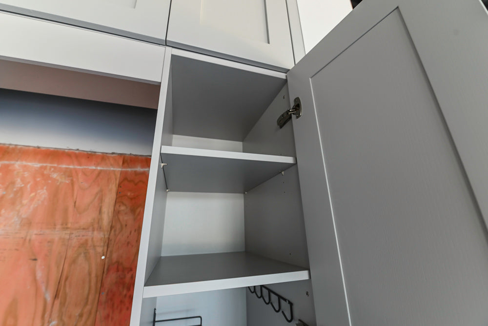 Häcker Transitional Light Grey Kitchen with Dark Grey Island and White Quartz Countertops