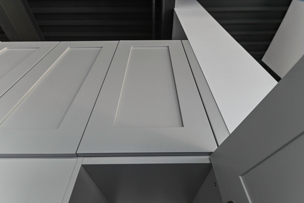 Häcker Transitional Light Grey Kitchen with Dark Grey Island and White Quartz Countertops