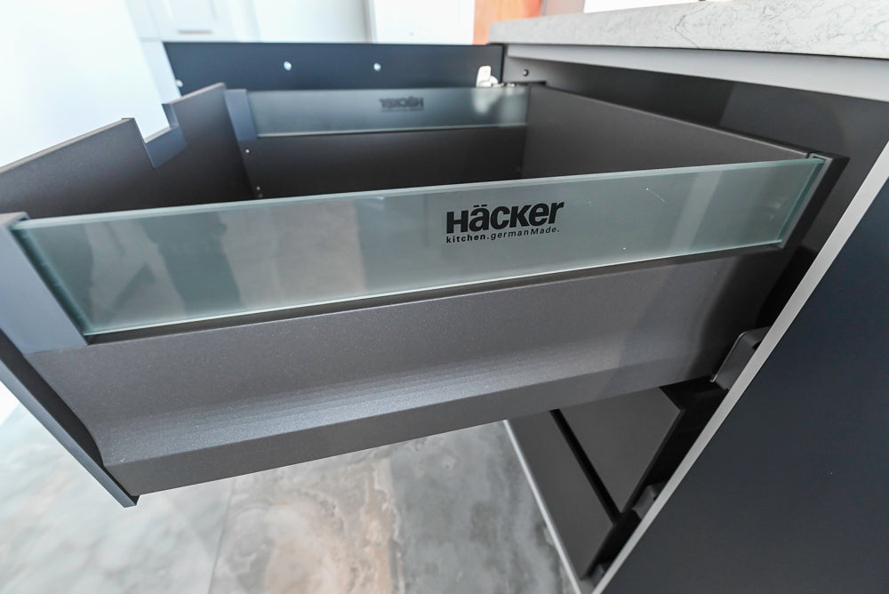 Häcker Transitional Light Grey Kitchen with Dark Grey Island and White Quartz Countertops