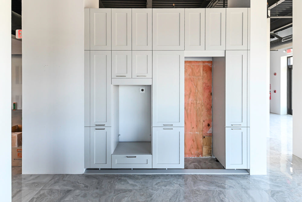 Häcker Transitional Light Grey Kitchen with Dark Grey Island and White Quartz Countertops