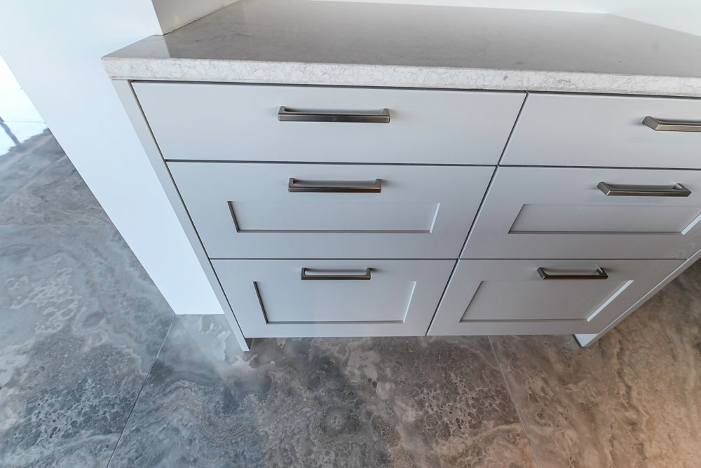 Häcker Transitional Light Grey Kitchen with Dark Grey Island and White Quartz Countertops