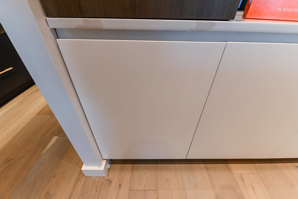 Composit Modern White & Brown Wood Veneer Kitchen with Enigma Countertops and Wolf Cooktop