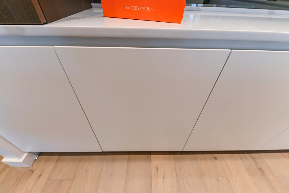 Composit Modern White & Brown Wood Veneer Kitchen with Enigma Countertops and Wolf Cooktop