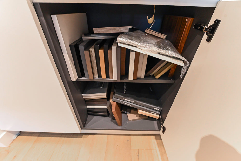 Composit Modern White & Brown Wood Veneer Kitchen with Enigma Countertops and Wolf Cooktop