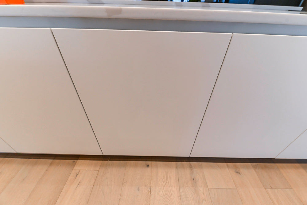 Composit Modern White & Brown Wood Veneer Kitchen with Enigma Countertops and Wolf Cooktop