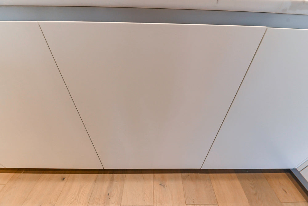 Composit Modern White & Brown Wood Veneer Kitchen with Enigma Countertops and Wolf Cooktop