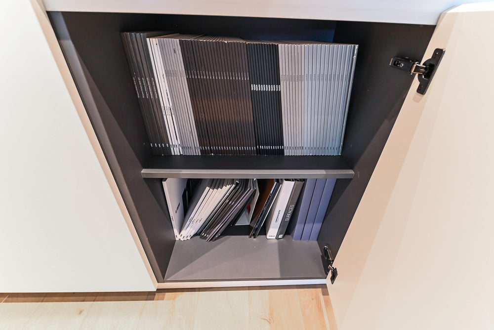 Composit Modern White & Brown Wood Veneer Kitchen with Enigma Countertops and Wolf Cooktop