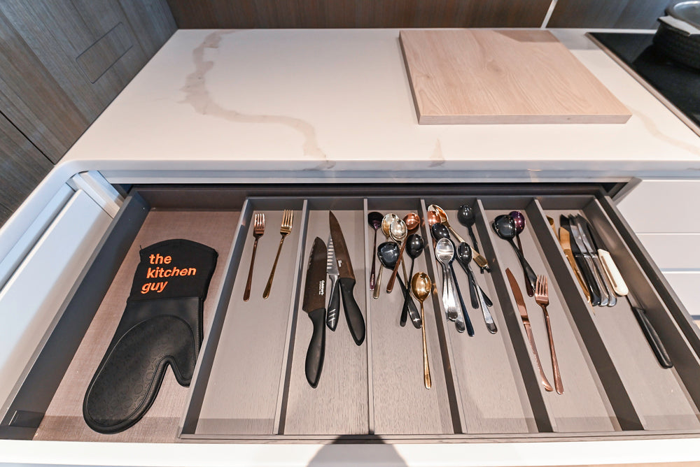 Composit Modern White & Brown Wood Veneer Kitchen with Enigma Countertops and Wolf Cooktop