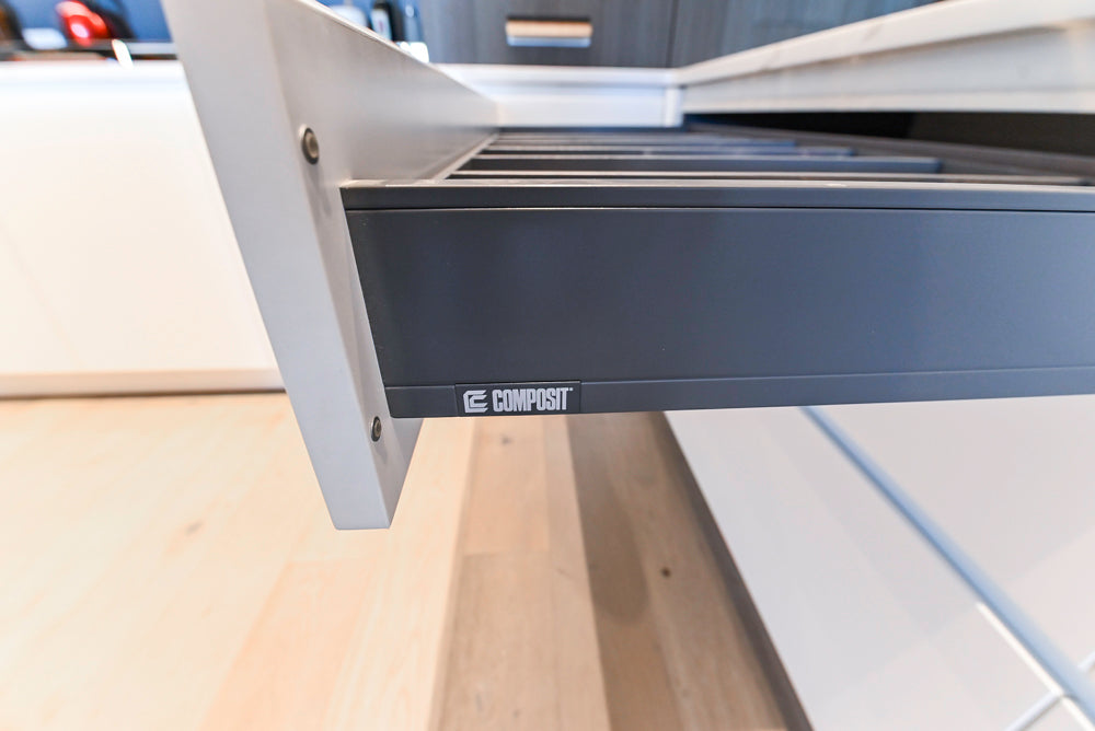 Composit Modern White & Brown Wood Veneer Kitchen with Enigma Countertops and Wolf Cooktop