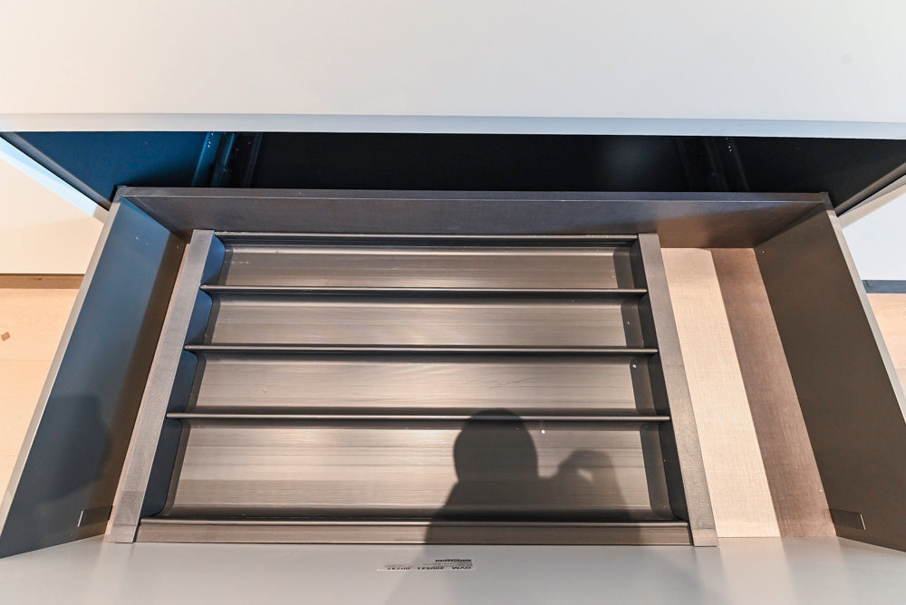 Composit Modern White & Brown Wood Veneer Kitchen with Enigma Countertops and Wolf Cooktop