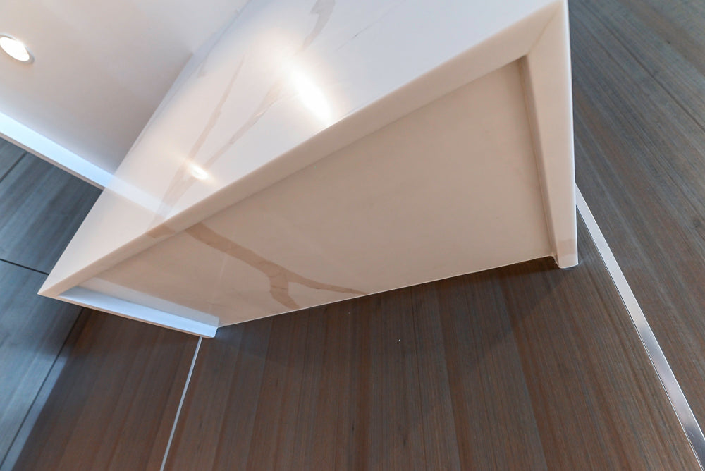 Composit Modern White & Brown Wood Veneer Kitchen with Enigma Countertops and Wolf Cooktop