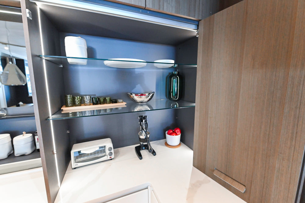 Composit Modern White & Brown Wood Veneer Kitchen with Enigma Countertops and Wolf Cooktop