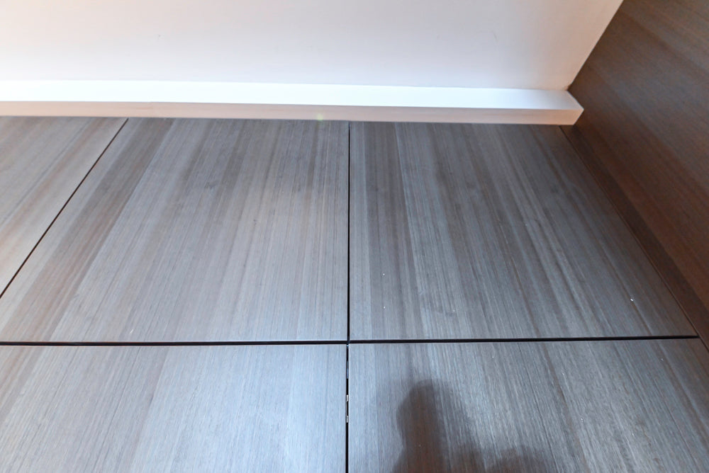 Composit Modern White & Brown Wood Veneer Kitchen with Enigma Countertops and Wolf Cooktop