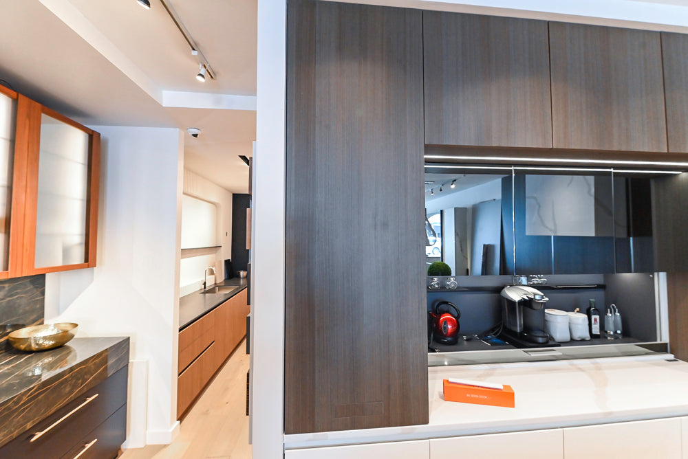 Composit Modern White & Brown Wood Veneer Kitchen with Enigma Countertops and Wolf Cooktop
