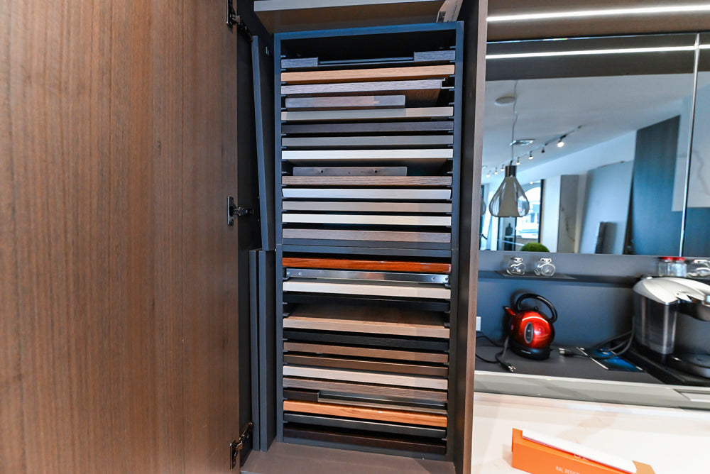 Composit Modern White & Brown Wood Veneer Kitchen with Enigma Countertops and Wolf Cooktop