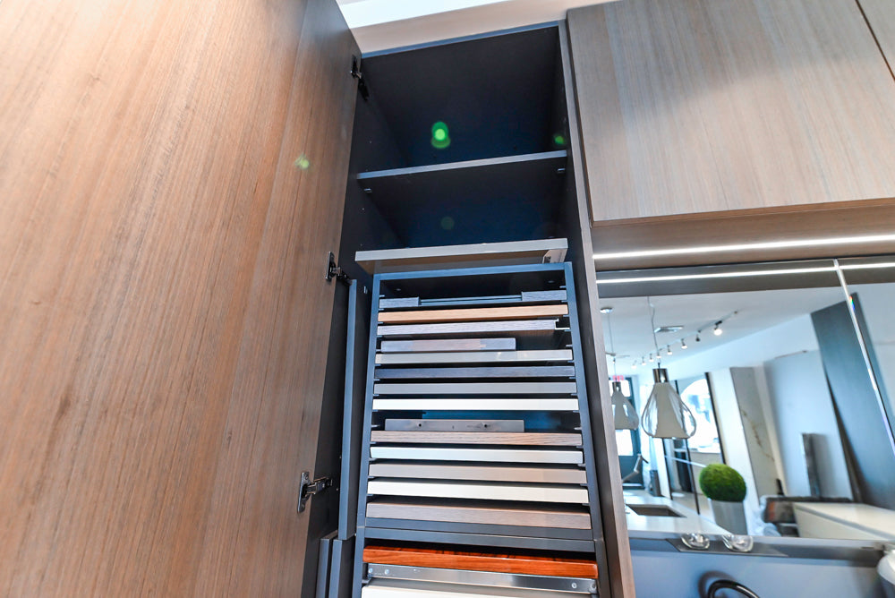 Composit Modern White & Brown Wood Veneer Kitchen with Enigma Countertops and Wolf Cooktop
