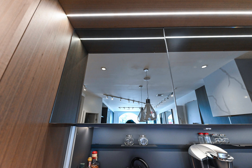 Composit Modern White & Brown Wood Veneer Kitchen with Enigma Countertops and Wolf Cooktop