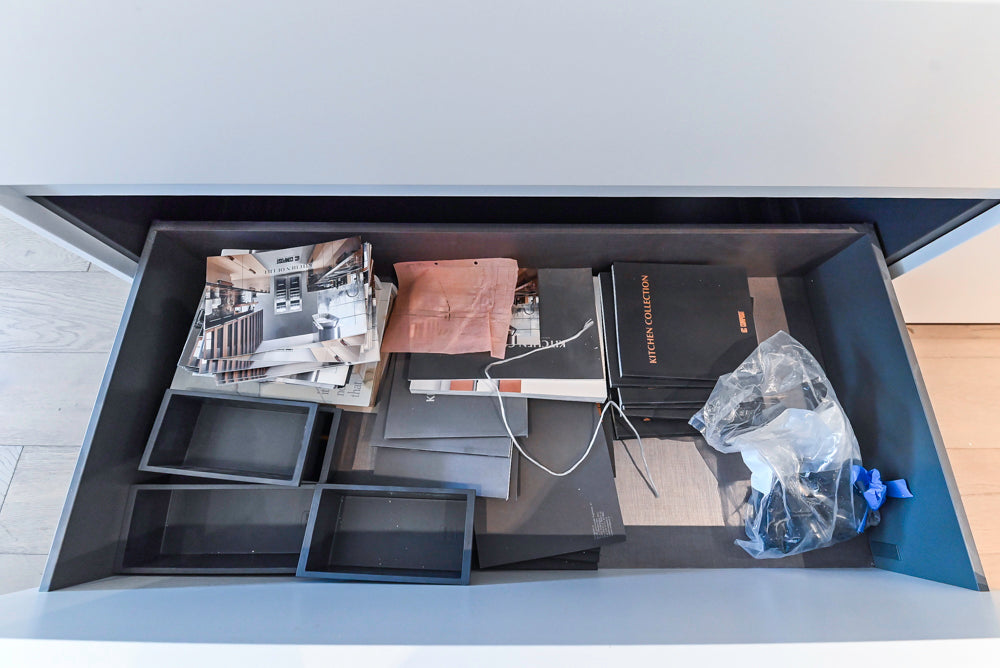 Composit Modern White & Brown Wood Veneer Kitchen with Enigma Countertops and Wolf Cooktop