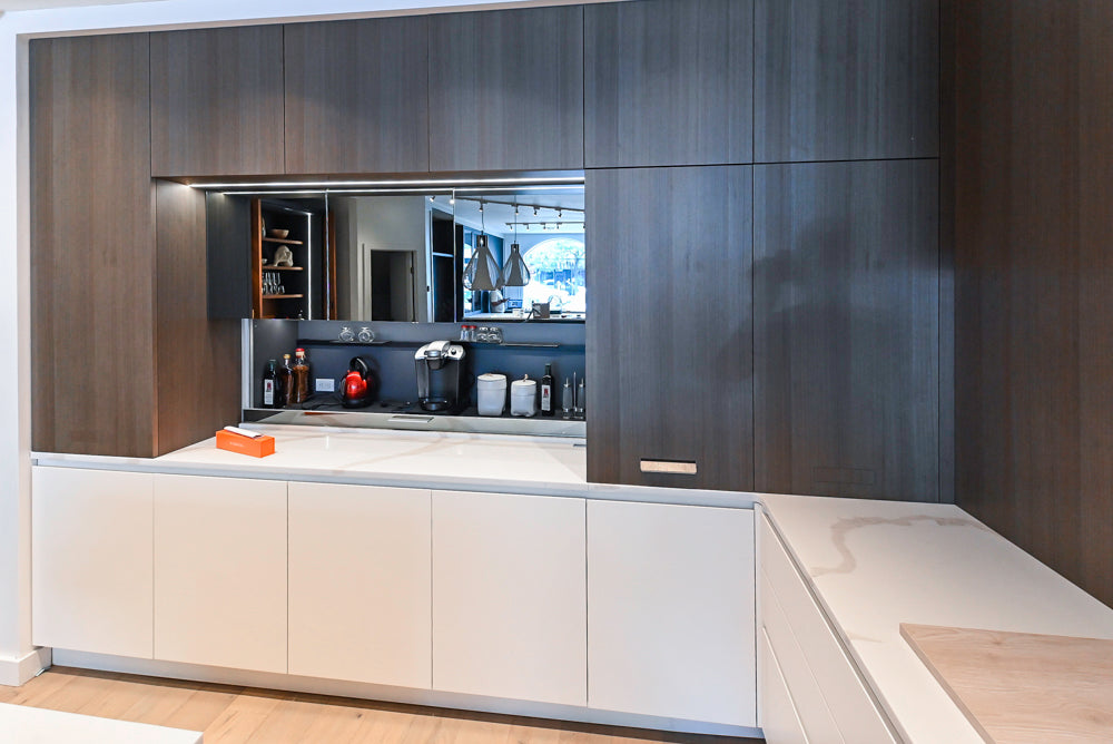 Composit Modern White & Brown Wood Veneer Kitchen with Enigma Countertops and Wolf Cooktop