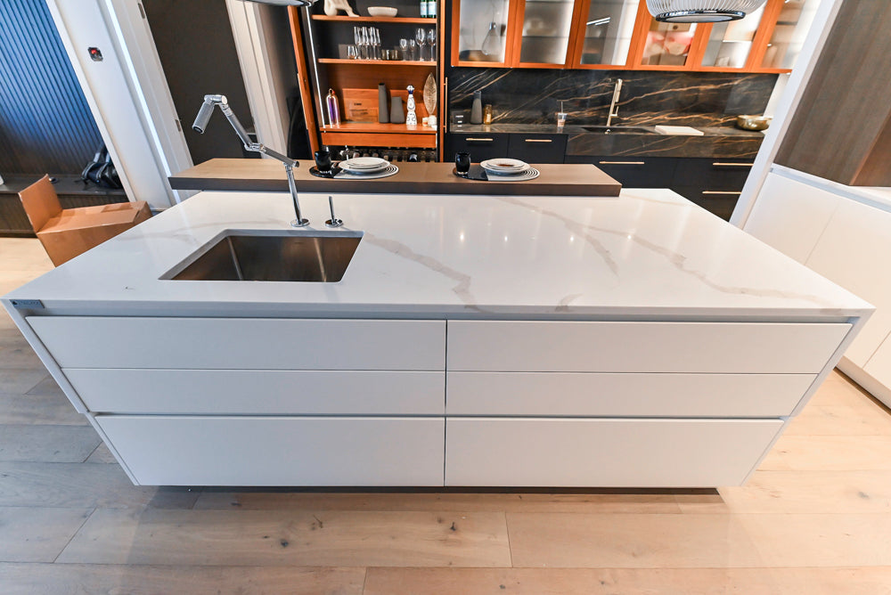 Composit Modern White & Brown Wood Veneer Kitchen with Enigma Countertops and Wolf Cooktop