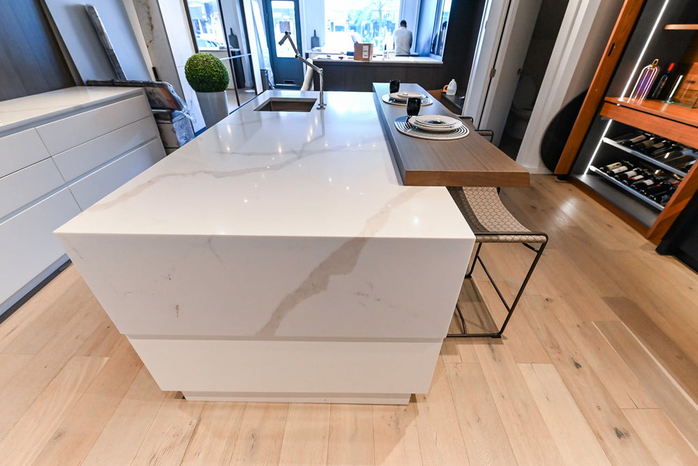 Composit Modern White & Brown Wood Veneer Kitchen with Enigma Countertops and Wolf Cooktop
