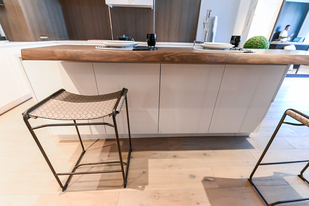 Composit Modern White & Brown Wood Veneer Kitchen with Enigma Countertops and Wolf Cooktop