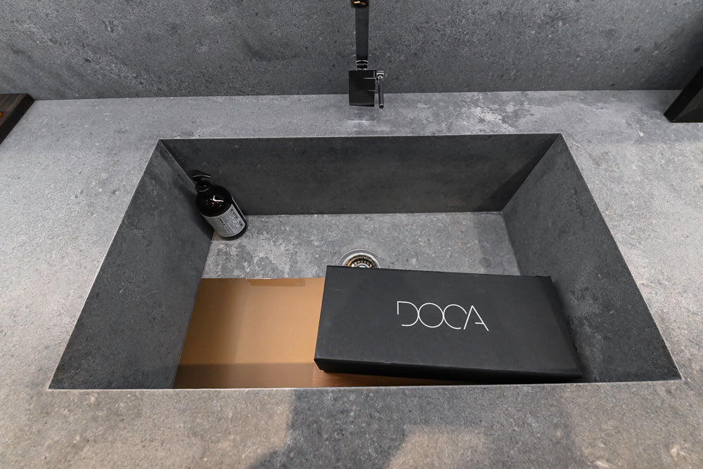 DOCA Modern Dark Brown Wood Veneer Kitchen Corner with White Ceasarstone Countertop & Integrated Sink