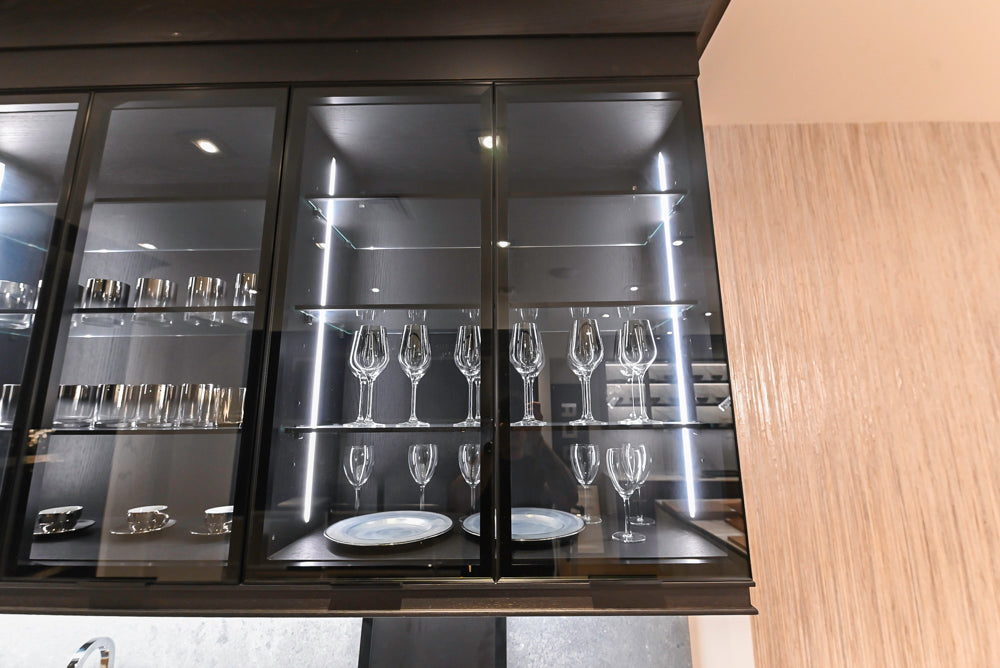 DOCA Modern Dark Brown Wood Veneer Kitchen Corner with White Ceasarstone Countertop & Integrated Sink