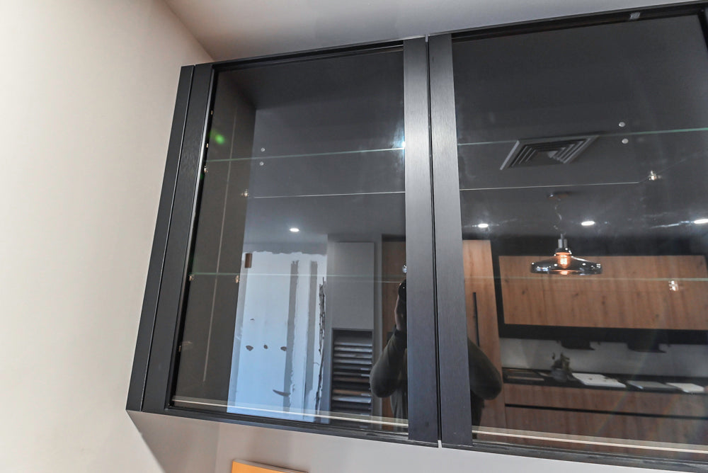 Muretti Modern Black Aluminum Framed Showroom Display Desk System with Storage and Open Shelving