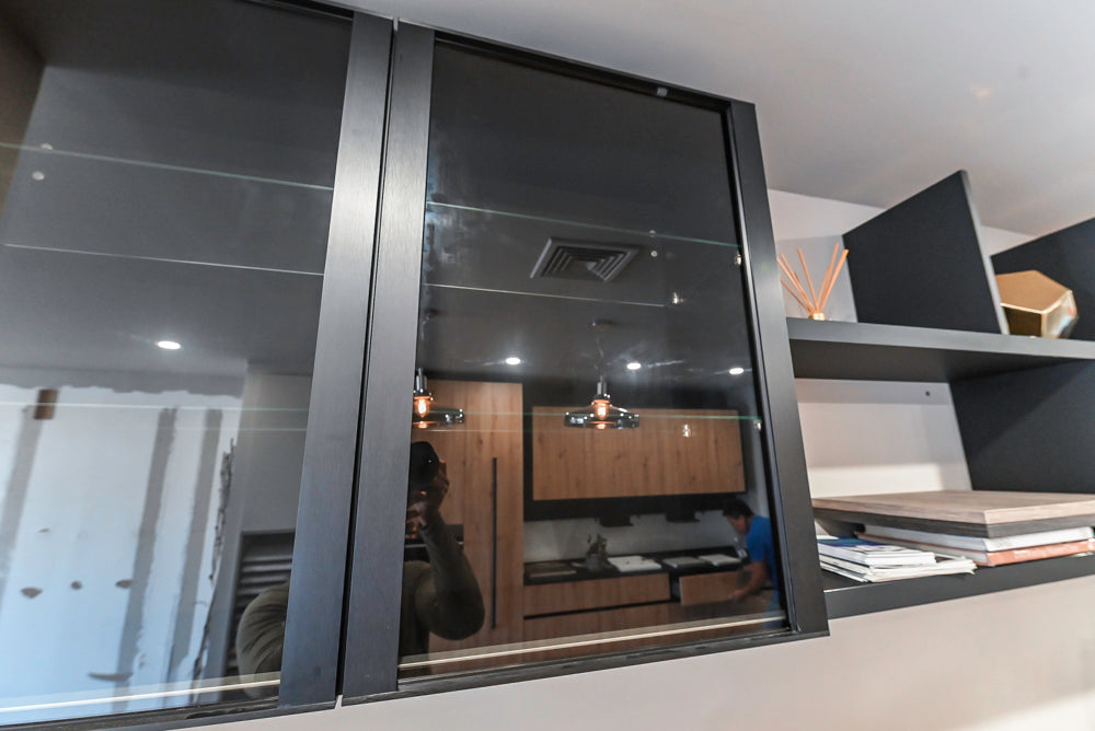 Muretti Modern Black Aluminum Framed Showroom Display Desk System with Storage and Open Shelving