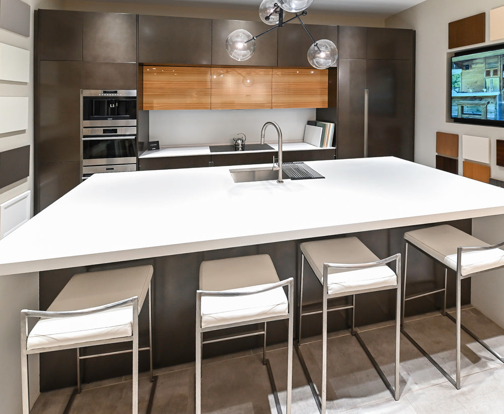 Composit Modern Brown Kitchen with Waterfall Island, Stone Countertops and Wolf & Sub-Zero Appliances