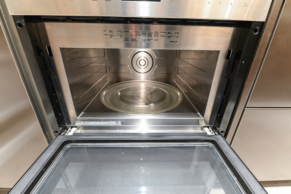 Composit Modern Brown Kitchen with Waterfall Island, Stone Countertops and Wolf & Sub-Zero Appliances