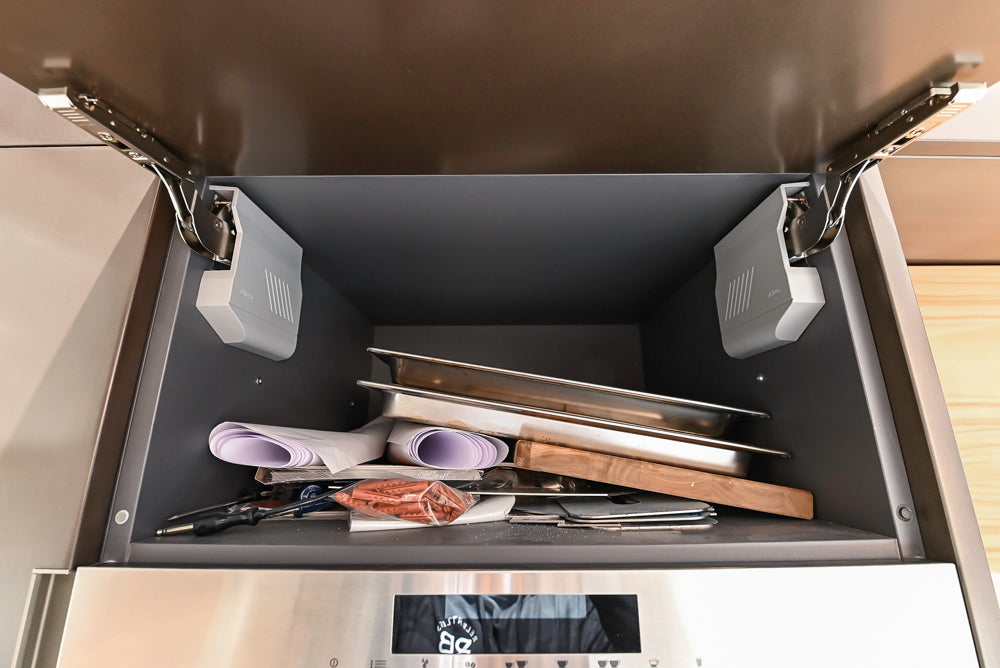 Composit Modern Brown Kitchen with Waterfall Island, Stone Countertops and Wolf & Sub-Zero Appliances