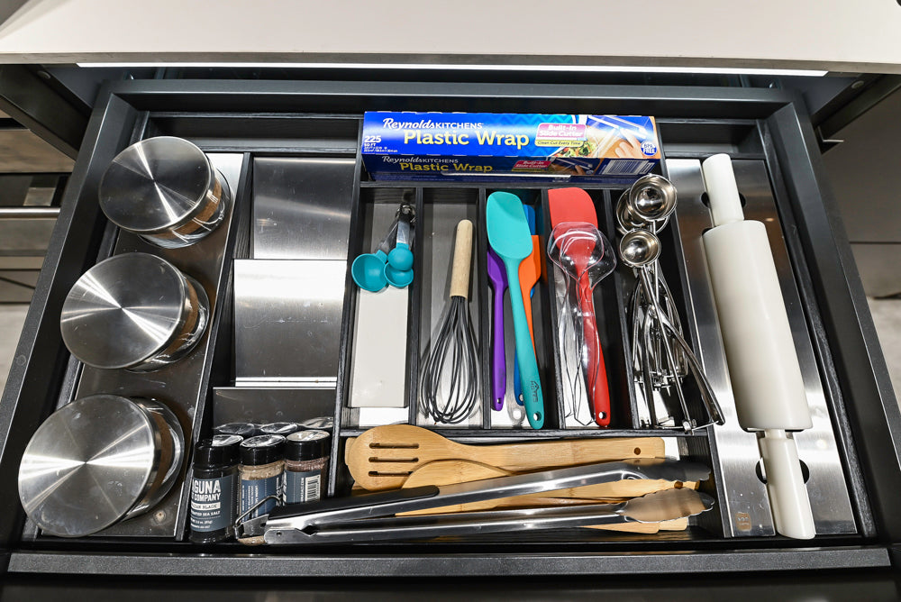 Composit Modern Brown Kitchen with Waterfall Island, Stone Countertops and Wolf & Sub-Zero Appliances