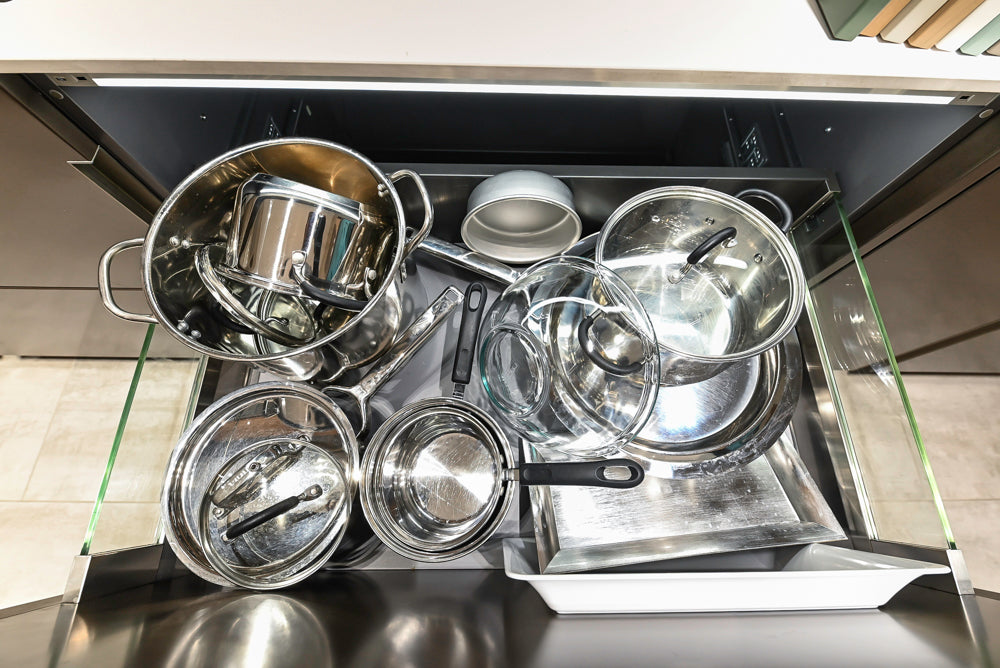 Composit Modern Brown Kitchen with Waterfall Island, Stone Countertops and Wolf & Sub-Zero Appliances