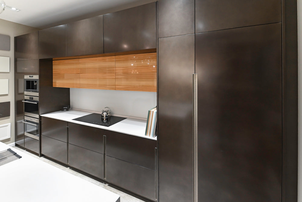 Composit Modern Brown Kitchen with Waterfall Island, Stone Countertops and Wolf & Sub-Zero Appliances