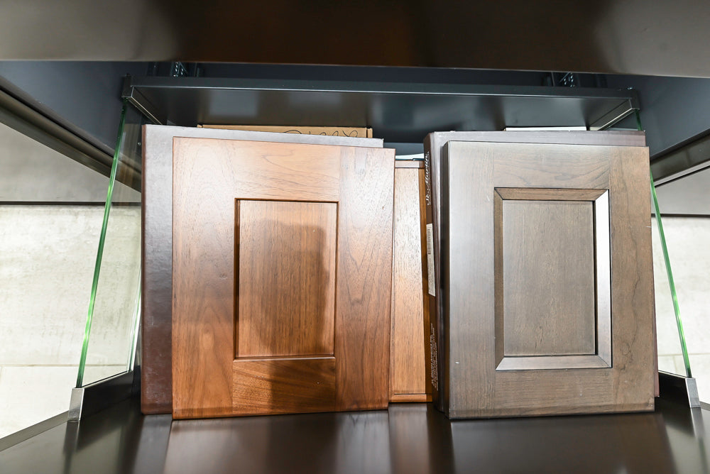 Composit Modern Brown Kitchen with Waterfall Island, Stone Countertops and Wolf & Sub-Zero Appliances