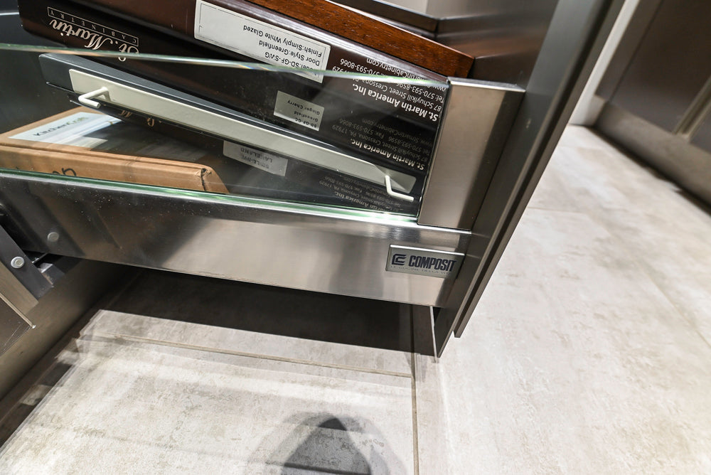 Composit Modern Brown Kitchen with Waterfall Island, Stone Countertops and Wolf & Sub-Zero Appliances