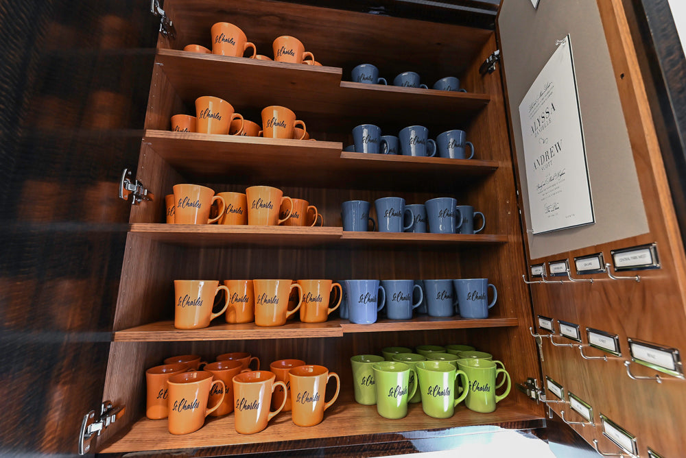 St. Charles Modern Kitchen with La Cornue Chateau Burgundy Cabinets and Glossy Eucalyptus with La Cornue Grand Palais 180 Rangetop and Custom Hood