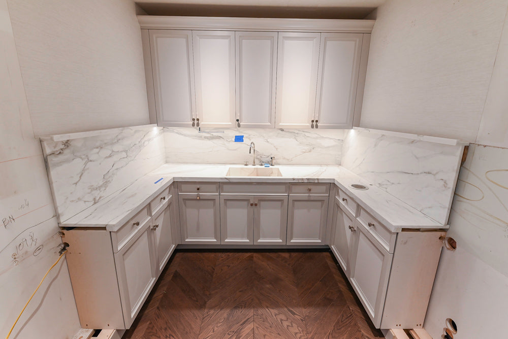 St. Charles Transitional Two-Tone White Butler's Pantry with Calcatta Marble Countertops