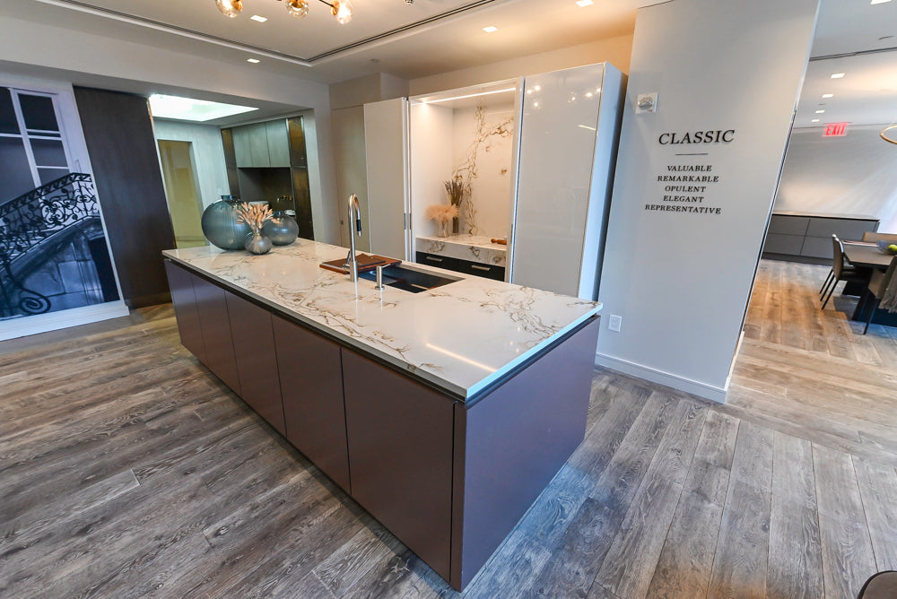 SieMatic S2 Modern Rose Gold Handleless Island with Lotus White Hideaway Pantry