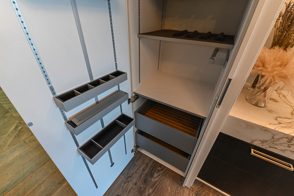 SieMatic S2 Modern Rose Gold Handleless Island with Lotus White Hideaway Pantry